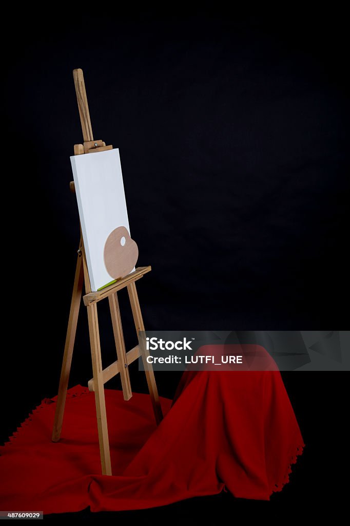 School Art Easel studio shot, black background, Artist's Canvas Stock Photo