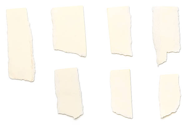 istock ripped yellow pieces of paper, isolated on white 487610201