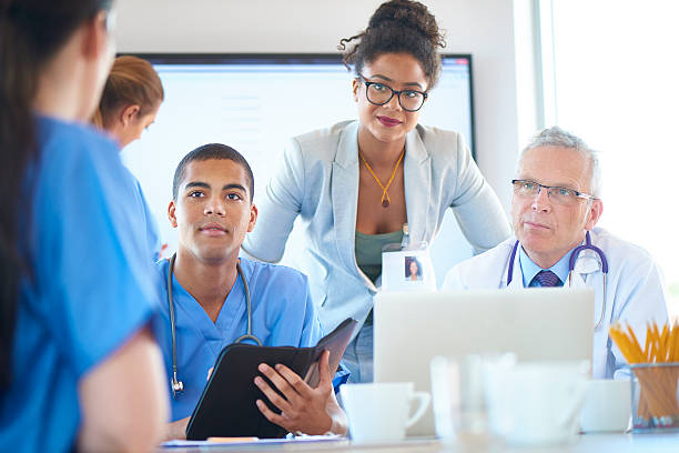 istock medical staff meeting 487610898