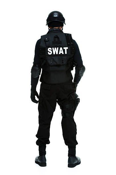 istock Rear view of police looking away 487612431
