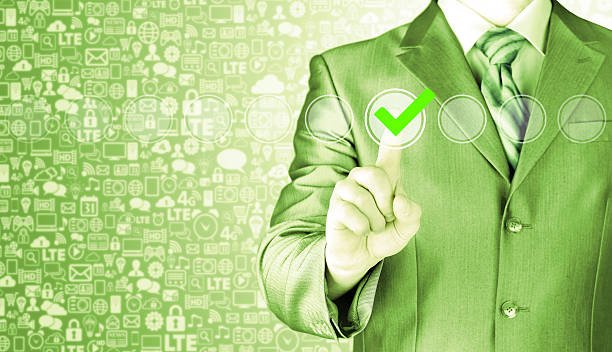 istock business man touching, pressing modern button with green ticking Check 487614120