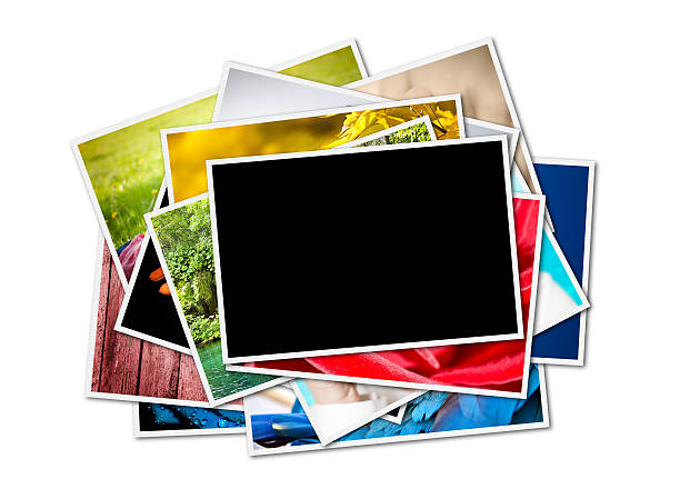 istock Pile of photographs with space for your logo or text. 487618063