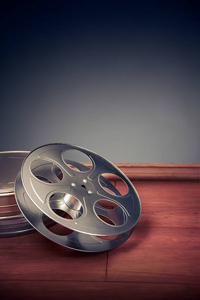 istock filmmaking scene with dramatic lighting, movie reel 487618660