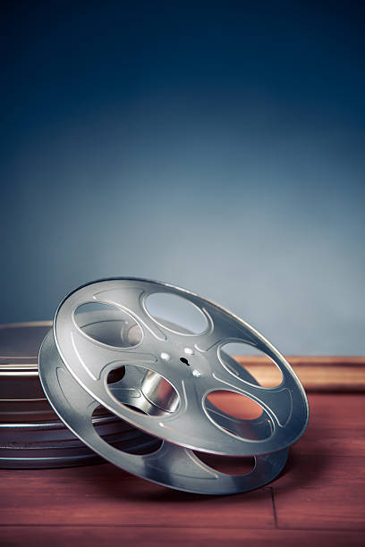 istock filmmaking scene with dramatic lighting, movie reel 487618662
