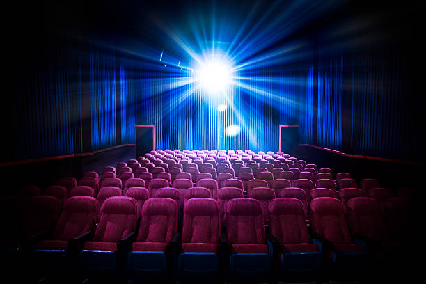 istock High contrast image of empty movie theater seats 487619254