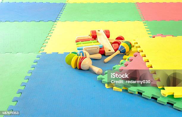 Toy On Rubber Foam Puzzles Stock Photo - Download Image Now - Mat, Exercise Mat, Playing