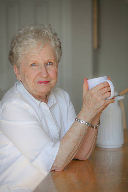 istock Beautiful senior woman enjoying her tea 487619798