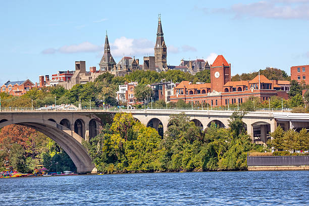 Key Bridge Georgetown University Washington DC Potomac River Key Bridge Potomac River Georgetown University Washington DC from Roosevelt Island.  Completed in 1923 this is the oldest bridge in Washington DC. potomac river photos stock pictures, royalty-free photos & images