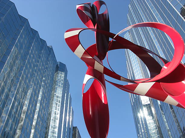 Glass buildings with Red and White Sculpture, Oklahoma City, Oklahoma stock photo