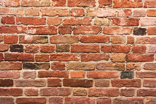 Detailed shot of brick wall of a building exterior.