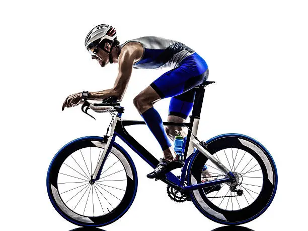 man triathlon iron man athlete bikers cyclists bicycling biking in silhouettes on white background