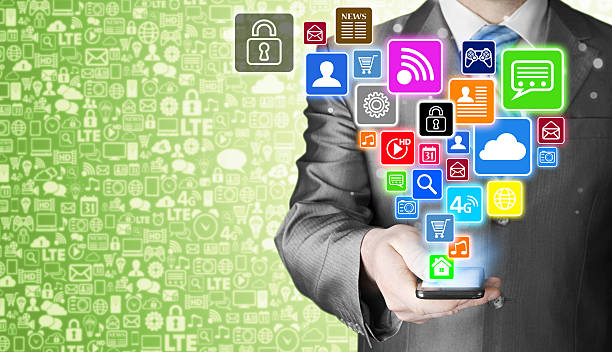 istock Business man using smart phone with social media icon set 487630342