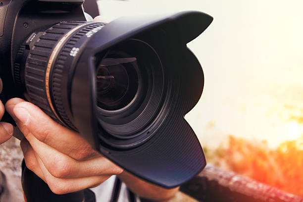 istock Portrait of a photographer at work 487631108