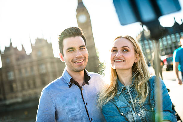 istock Couple take a selfie at Big ben in London 487635190