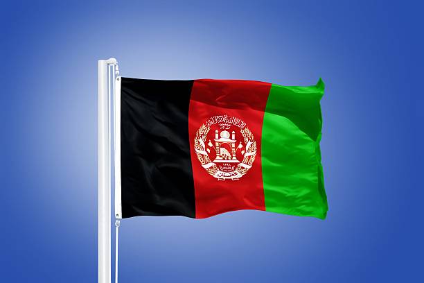 istock Flag of Afghanistan flying against a blue sky 487646066