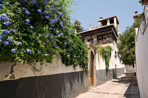Granada, Spain - May 30, 2015: Typical street in Albaycin quarter of Granada with nobody on 30 May 2015