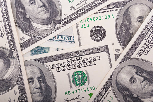 istock Background of U.S. dollars 487650547