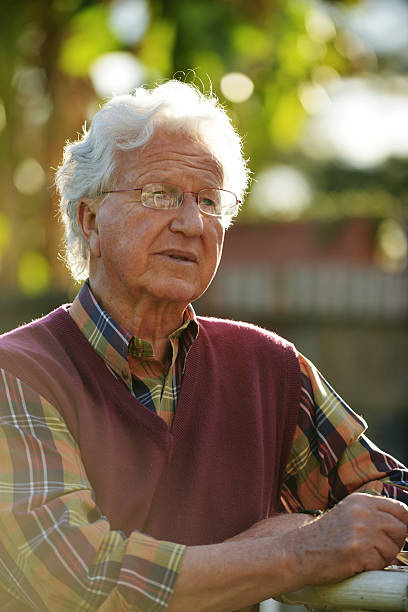 istock Man in the garden at sunset 487650805