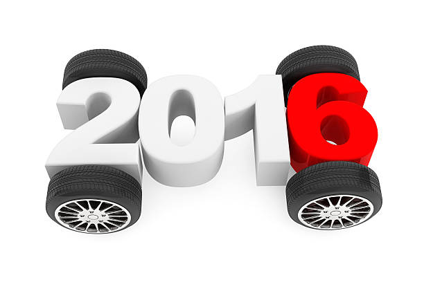 istock 2016 year concept with car wheels 487652460