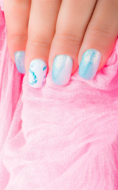 istock Nail art and pink scarf 487652722