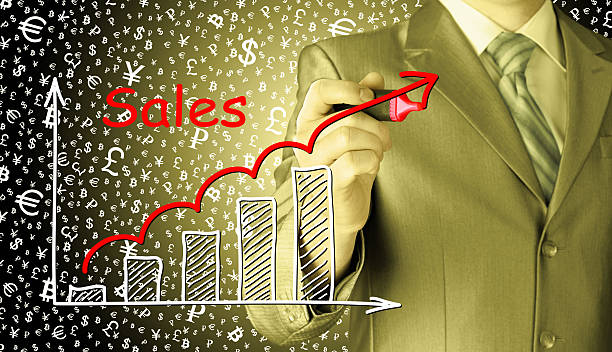 istock business man drawing graph of sales 487654672