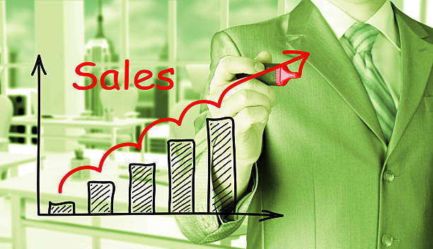 istock business man drawing graph of sales 487654682