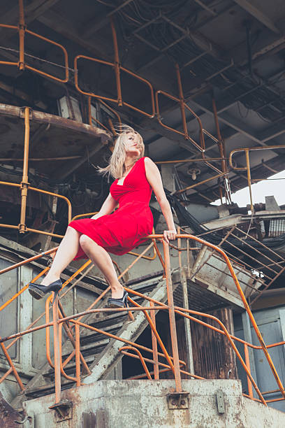 istock beautiful asian women posing on excavator background 487655190