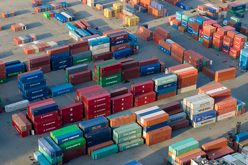 Ho Chi Minh City, Vietnam - Jul 1, 2014: Lot's of cargo freight containers in the Ho Chi Minh City sea port on Jul 1, 2014