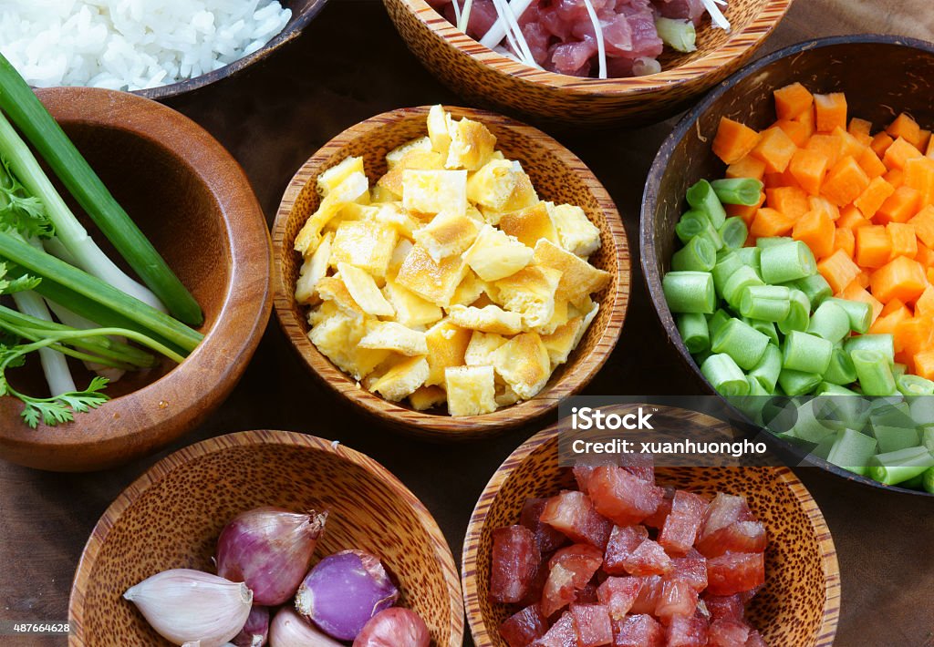 Vietnamese food, fried rice, Asian eating Vietnamese food, fried rice, a delicious Asian eating, raw material as carrot, cooked rice, meat, egg, sausage, onion, garlic, this meal rich cholesterol, calories 2015 Stock Photo