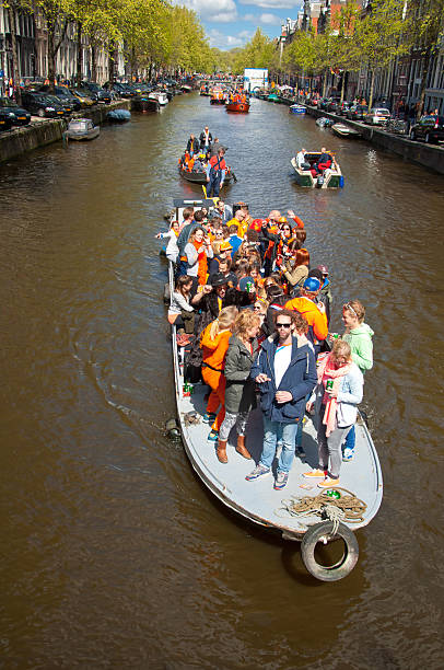 People on Party Boat with unlimited beer, soda and wine. stock photo