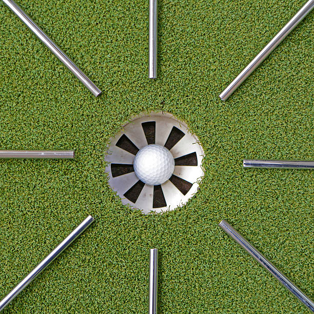 istock Golf steel shafts pointing at the golf hole 487666446