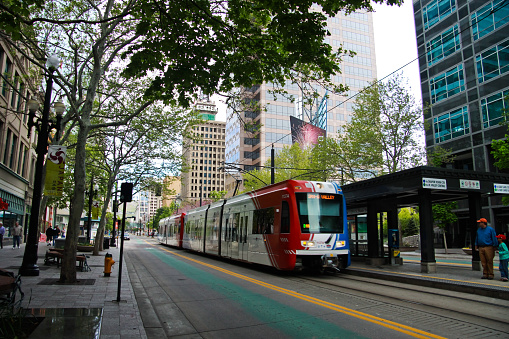 Salt Lake City, UT, USA - May 2, 2014: Main downtown area in Salt Lake City; in the background is the Zions Bank building in the foreground is a tram crossing. Salt Lake City is a very beautiful city.