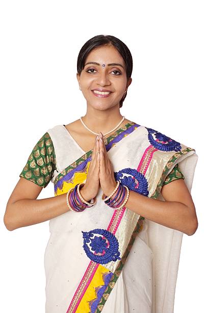 istock Traditional Indian Woman greeting with a smile. 487668079