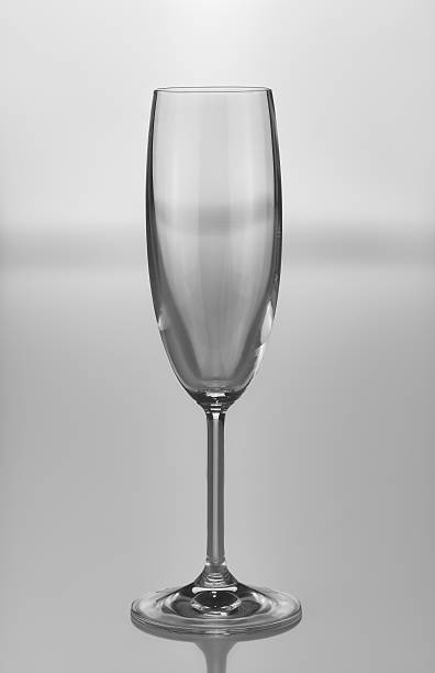 istock Empty Champaign wine glass in black and white 487668346