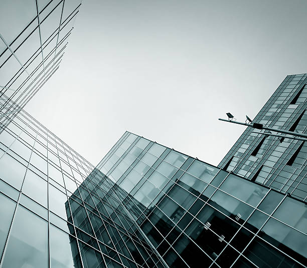 istock wide angle view to dark high rise skyscrapers at night 487669421