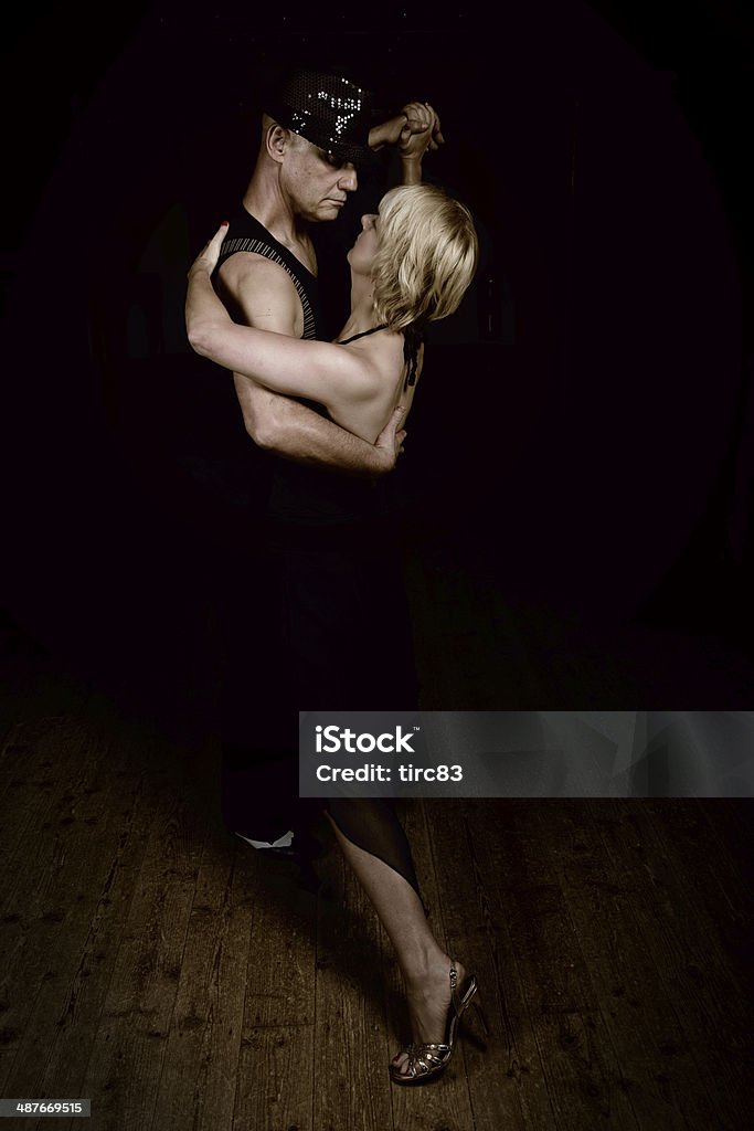 Mature ballroom dancing couple Mature caucasian ballroom dancing couple in action Mature Couple Stock Photo