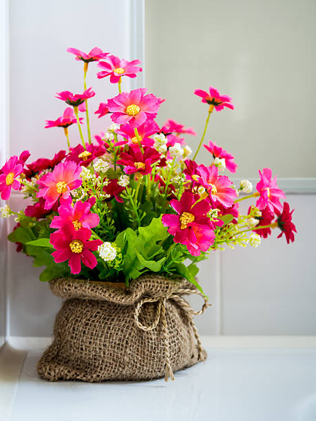 istock Modern interior room decorate with colorful artificial flowers 487669901