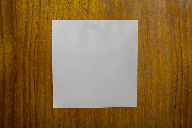 istock Wood texture and paper reminder. 487670221