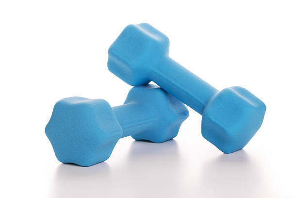 istock Fitness concept with two blue dumbbells on white background 487671684