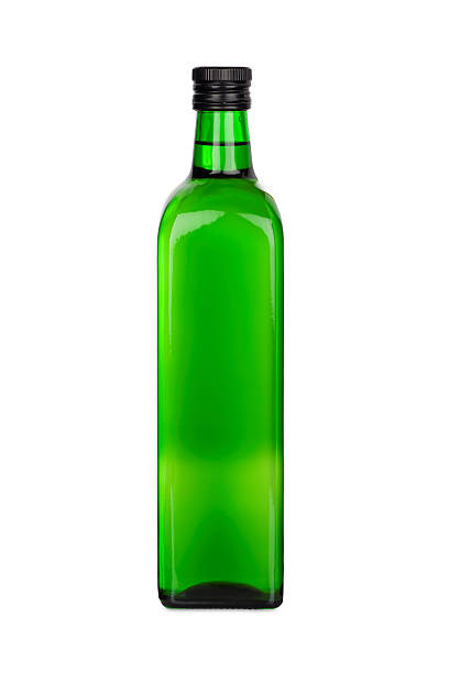 istock Green Glass bottle with rape oil 487671935