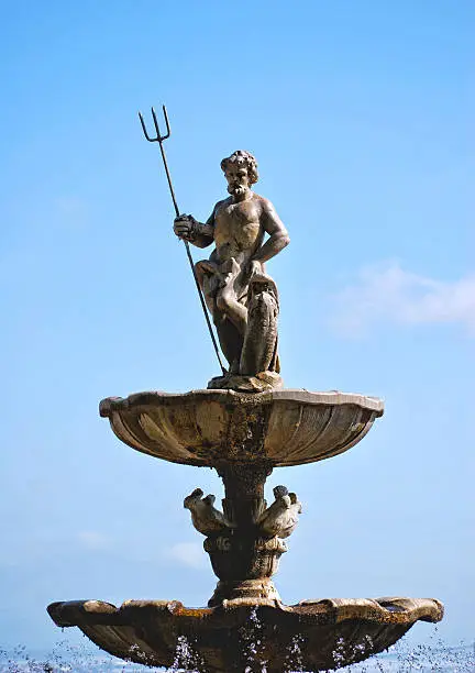 Acient fountain depcting the god Neptune