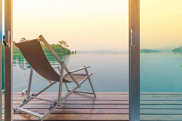 istock Beach chairs on perfect tropical lake 487672486