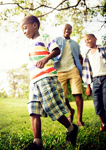 istock African Family Happiness Holiday Vacation Activity Concept 487673606