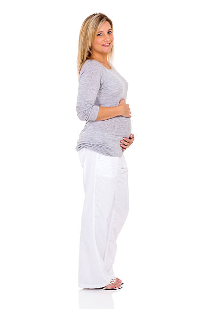 happy pregnant woman full length on white background