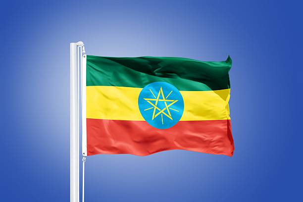 istock Flag of Ethiopia flying against a blue sky 487674240