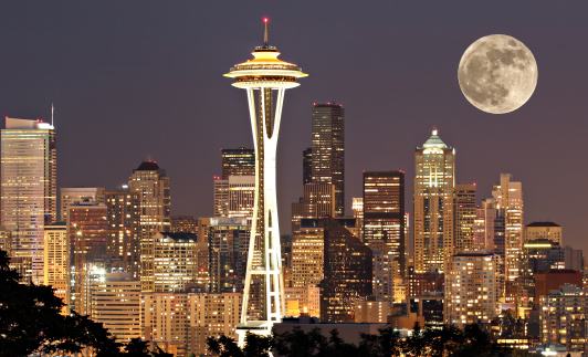 The lights come on in Seattle with a full moon