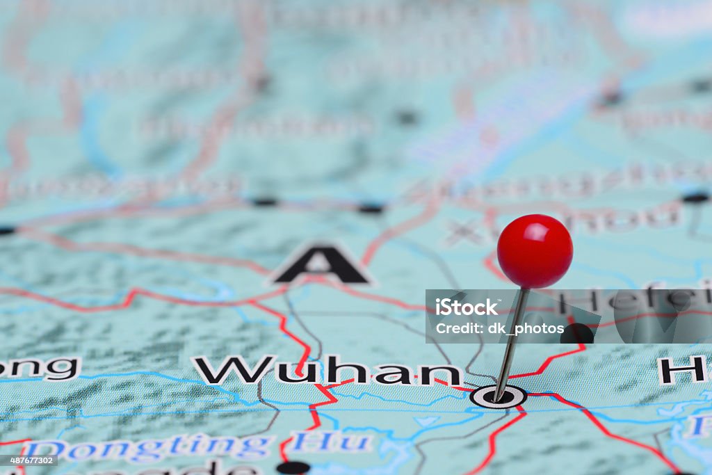 Wuhan pinned on a map of Asia Photo of pinned Wuhan on a map of Asia. May be used as illustration for traveling theme. Wuhan Stock Photo
