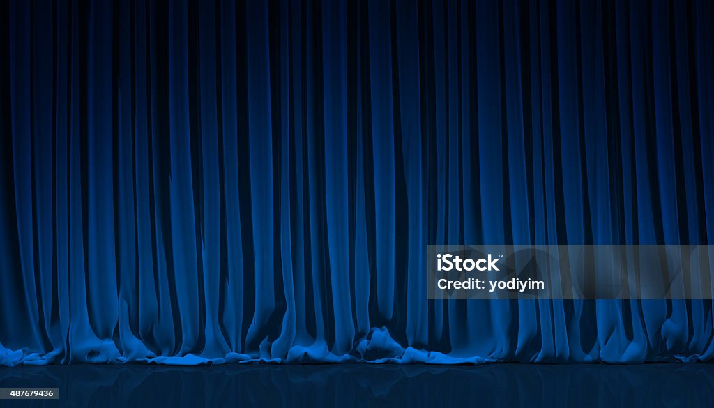 Blue curtain in theater. Blue curtain on theater or cinema stage. Curtain Stock Photo