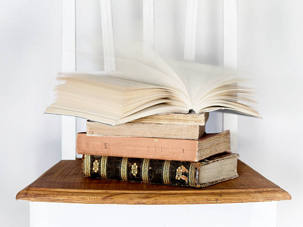 istock old books on a chair 487684482