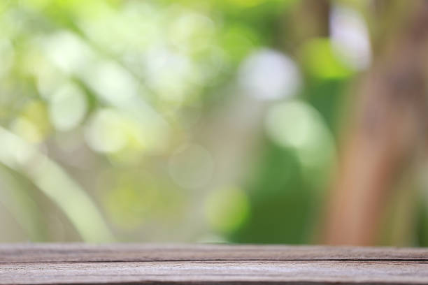 istock wood floor and colorful bokeh. 487684562